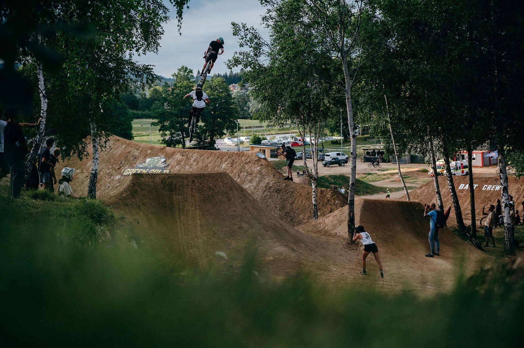 Two guys riding big jump